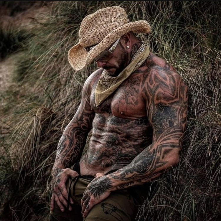 Male stripper posing outdoors before performing at a ladies night event, exuding confidence and charisma. Male Strippergrams near me