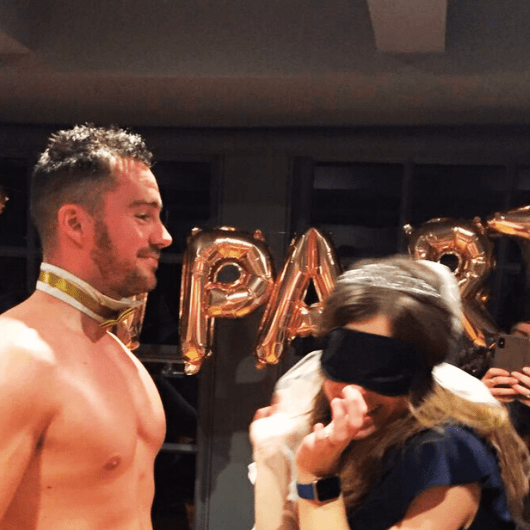 Guests playing party games with buff butlers in Rickmansworth