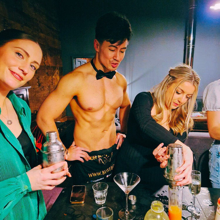 Cheeky butlers in London leading a fun cocktail making class for a hen do.
