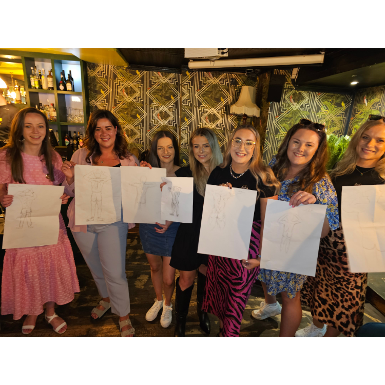 Buff butlers hosting a creative life drawing hen party in a Manchester Airbnb