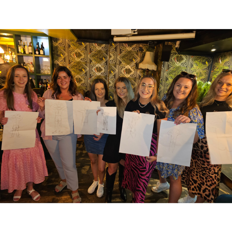 Buff butlers hosting a creative life drawing hen party in a Truro Airbnb
